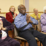 Senior adults in a stretching class